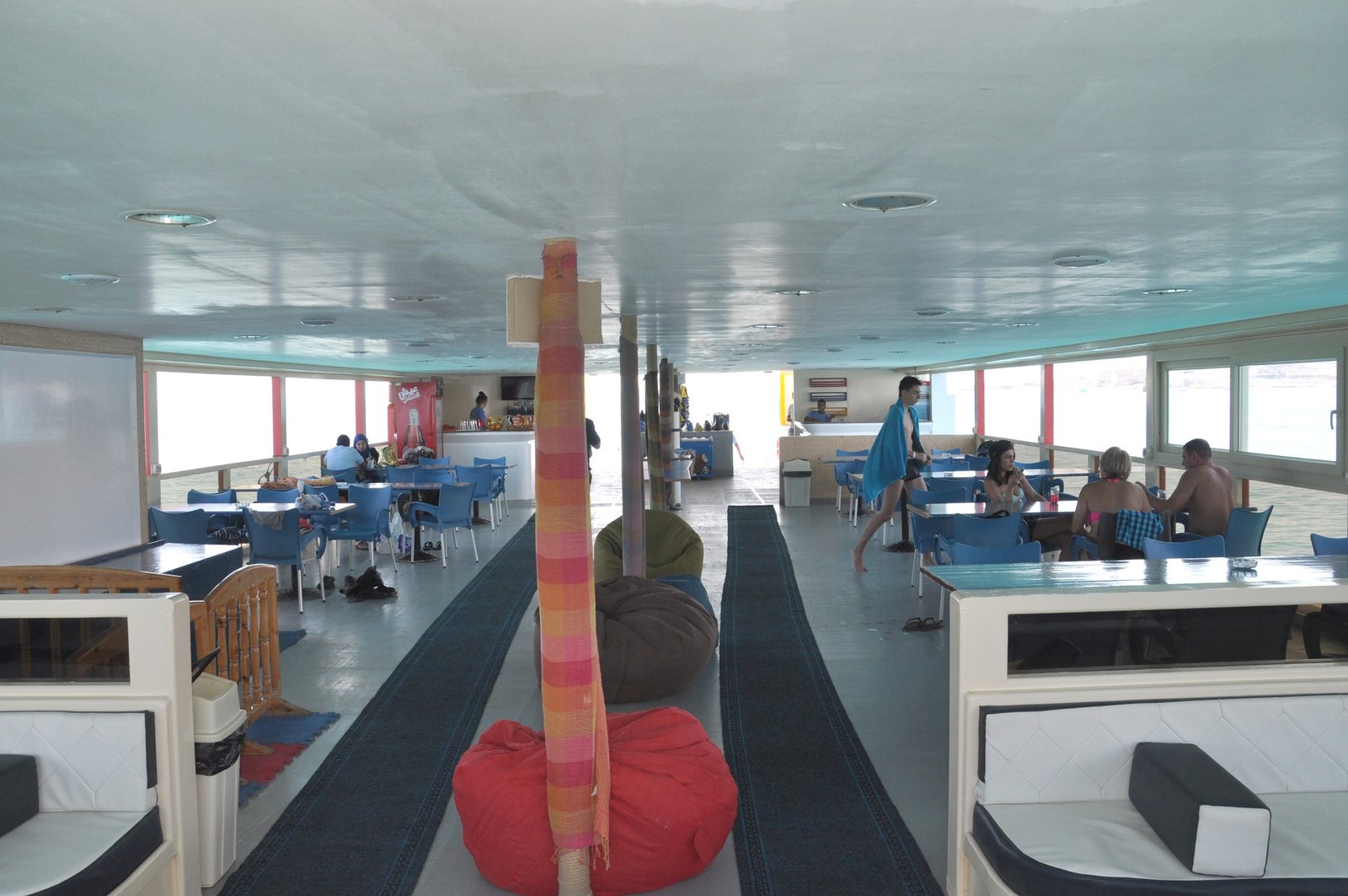 Covered deck seating and walkway on a Semi Submarine Hurghada excursion boat