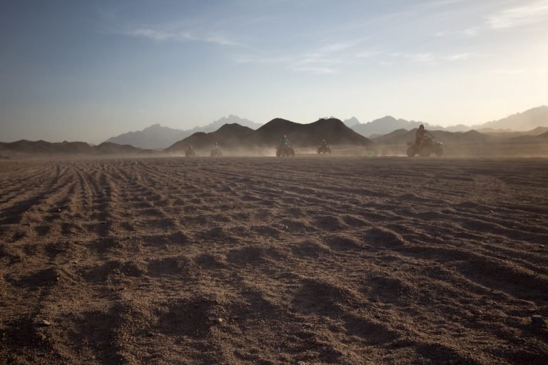 Open desert landscape on the approach to a safari visitor stop