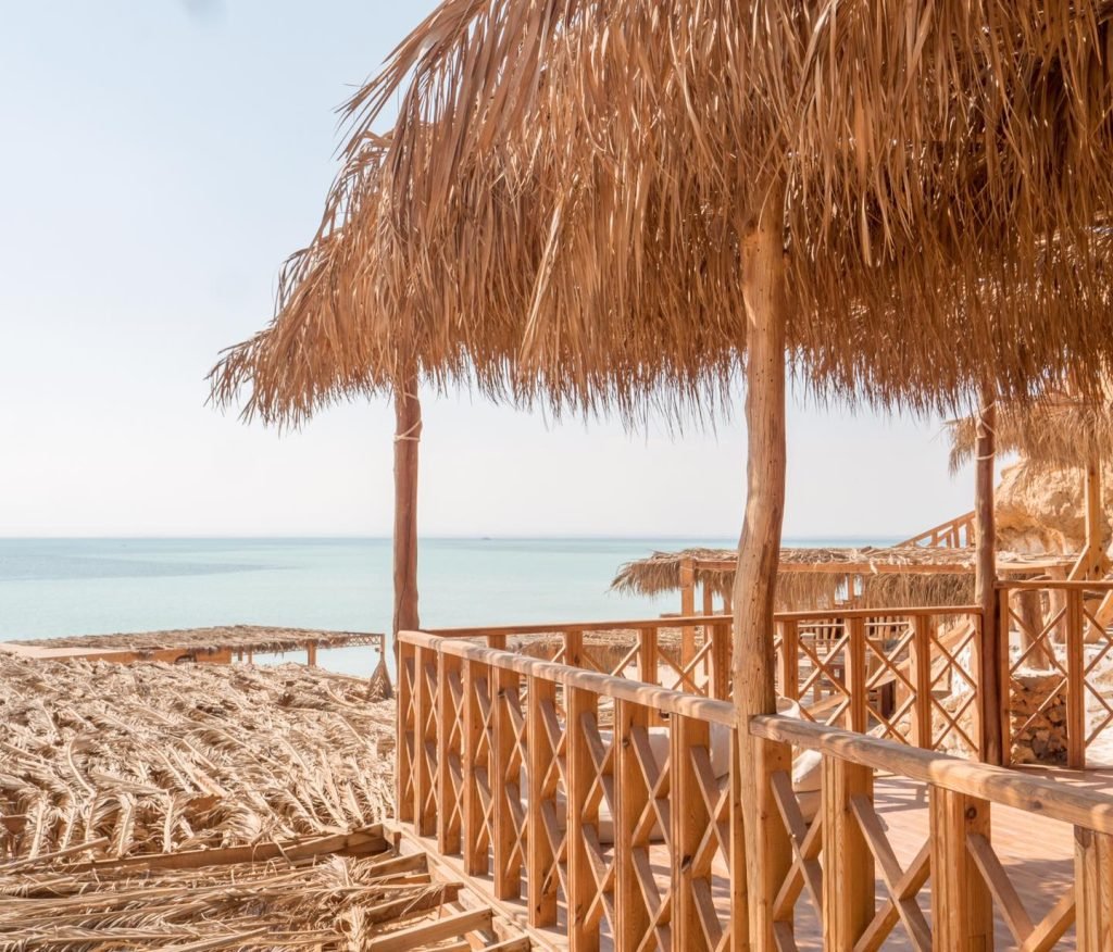Thatched wooden terrace overlooking the sea at Orange Bay