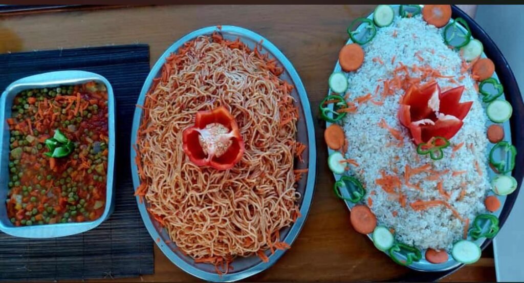 Onboard buffet with rice, spaghetti and mixed vegetables