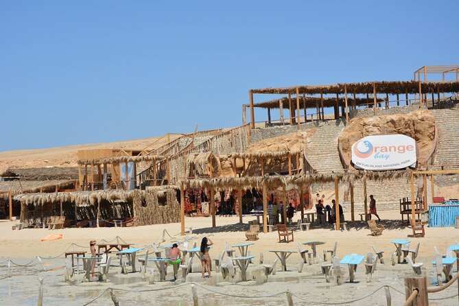 Beach seating and visitor facilities at Orange Bay