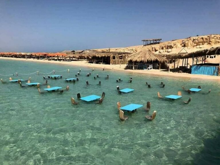 Shallow water and beach seating at Orange Bay