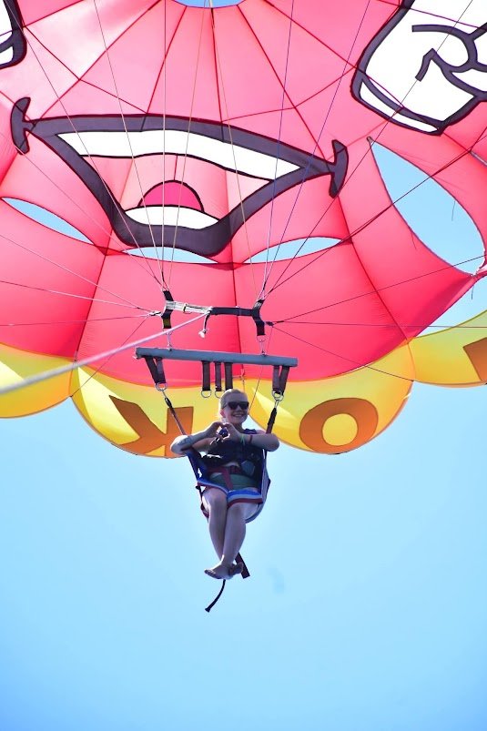 Parasailing as one of the best half-day trips in Hurghada