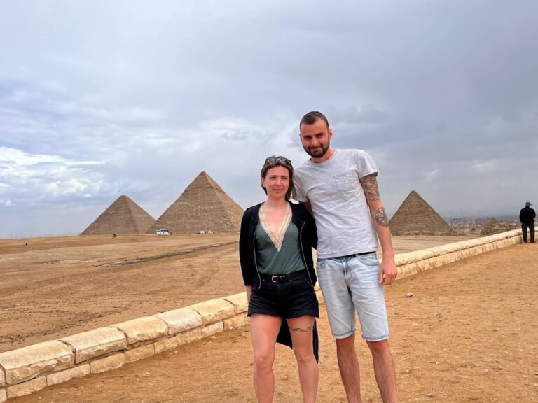 Visitors at the Giza Pyramids panorama on a Cairo excursion from Hurghada