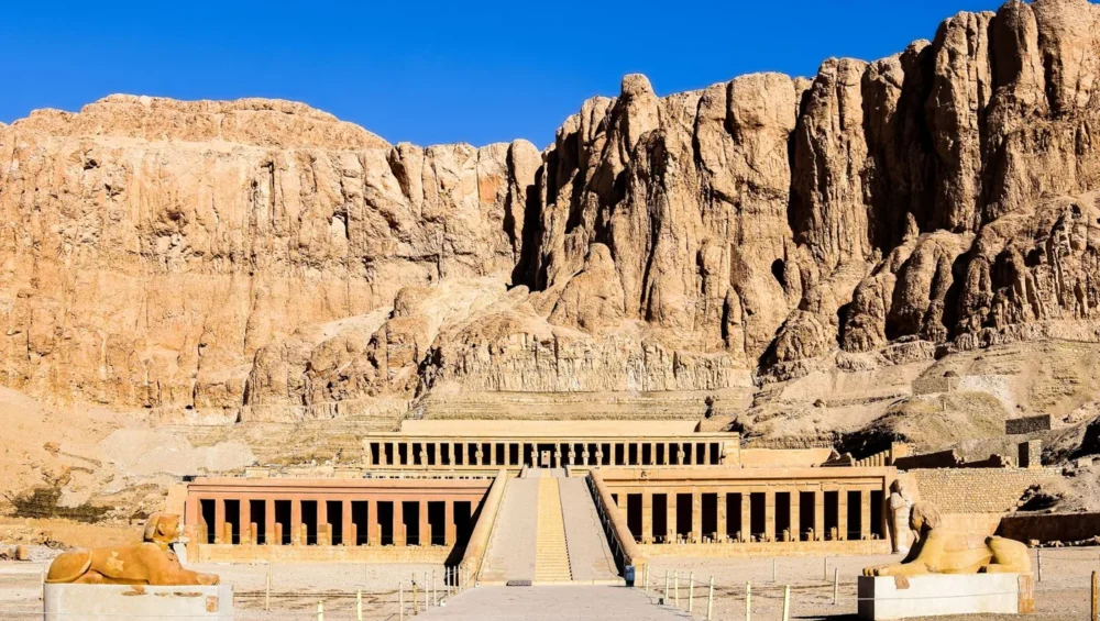 Temple of Hatshepsut beneath the cliffs in Luxor