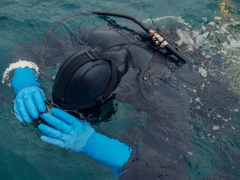 Scuba diver wearing a mask and breathing apparatus